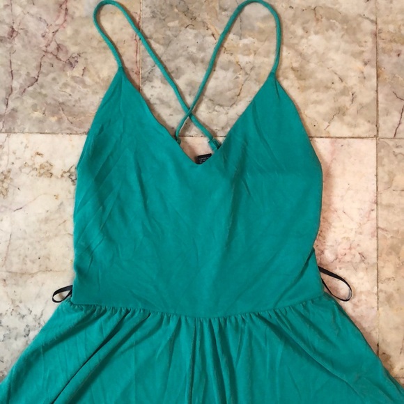 Green jumpsuit with straps - Picture 2 of 4